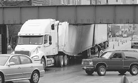Who pays price when trucks get stuck under the bridge?